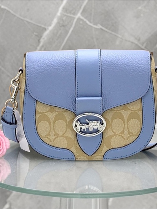 Coach Handbags - COACH Georgie Saddle Bag In Signat Canvas COLOR:
Silver/Light Khaki/Marble
Blue